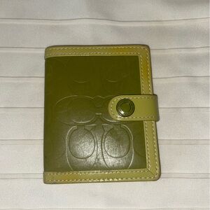 Green Coach Mini Photo Album. Same size as a wallet! Never before worn.